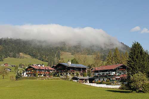 Clouds move like a wave over the mountains in Reit im Winkl - Jrg Nitzsche Hamburg Germany