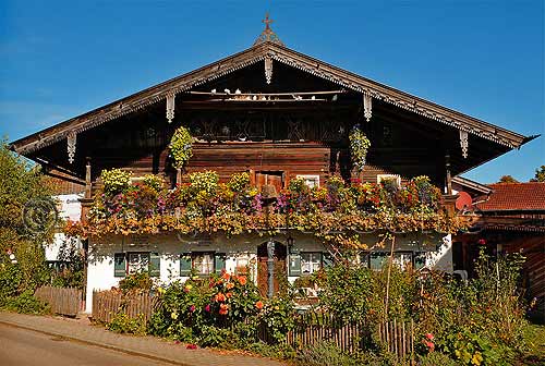 Romantic, flower-decorated wooden houses in Chiemgau - Jrg Nitzsche Hamburg Germany