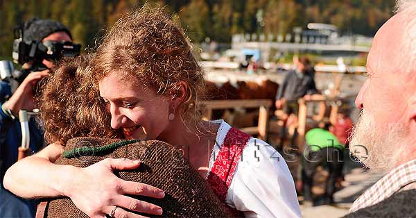 The young dairymaid and her parents meet again after 4 months and greet each other warmly - Jrg Nitzsche Hamburg Germany