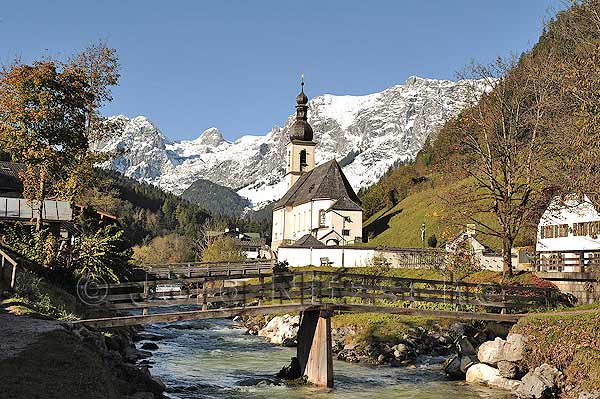 The famous postcard motif of Ramsau - View of the parish church of St. Sebastian (It was built in 1512 under Prince-Provost Gregor Rainer, the consecration of the altar took place in 1518) and the riders Alpe in the background - Jrg Nitzsche Hamburg Germany